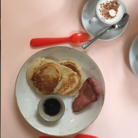 Children's pancakes with bacon and maple syrup